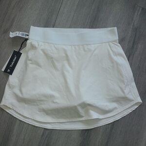 TNA ACTION MOVE RALLY SKIRT SIZE SMALL